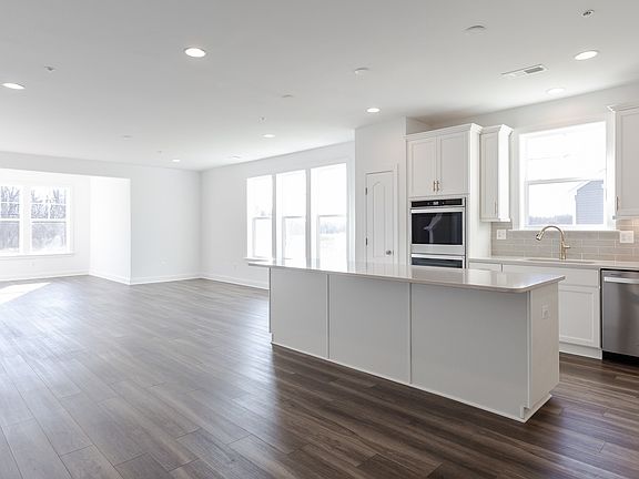 Open main level with abundance of windows in a DRB Homes Starling II home in the Rosehill Manor comm