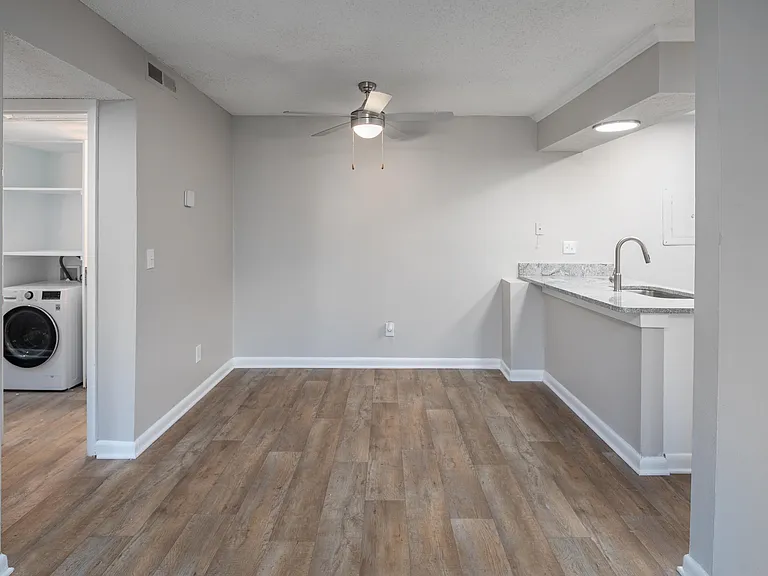 Dining area with hardwood-style flooring