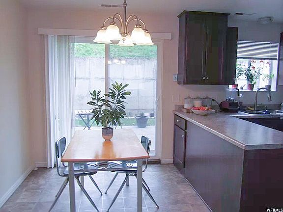 Dining area and entrance to backyard. Doggy door optional.