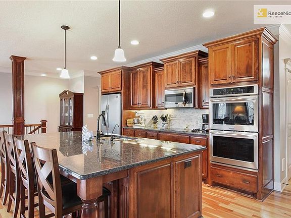 Kitchen Features Amazing Granite Island Space & Upgraded Appliance Package