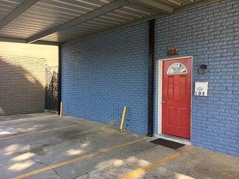 Front Entrance and Covered Parking