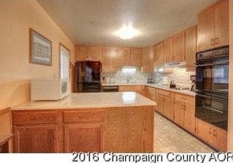 Large eat-in kitchen with island, breakfast-bar. Brand New Stainless Steel Refrigerator.
