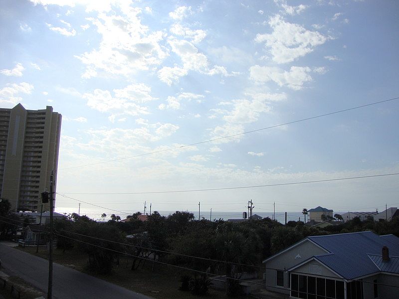 View from roof
						:
						Looking southwest from roof of exising house. Gulf of Mexico visible.