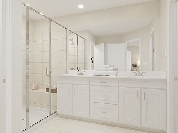 Treat yourself to a primary suite that inspires serenity