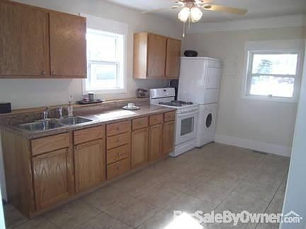 Kitchen
						:
						The gas stove and wash/dryer is on the left, frig. is on rt. out of view.