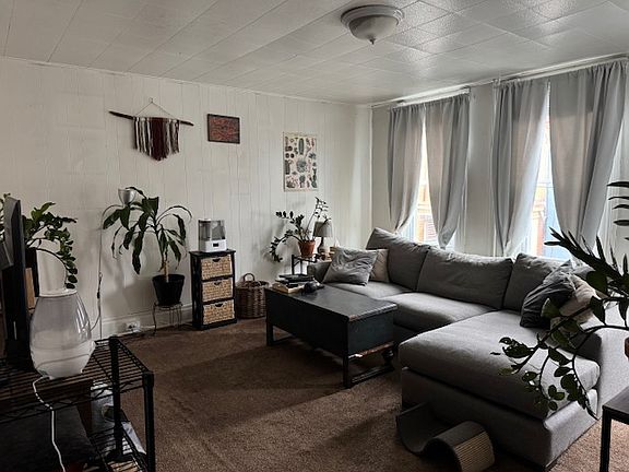 Large 2nd floor living room with 3 windows provide beautiful natural light