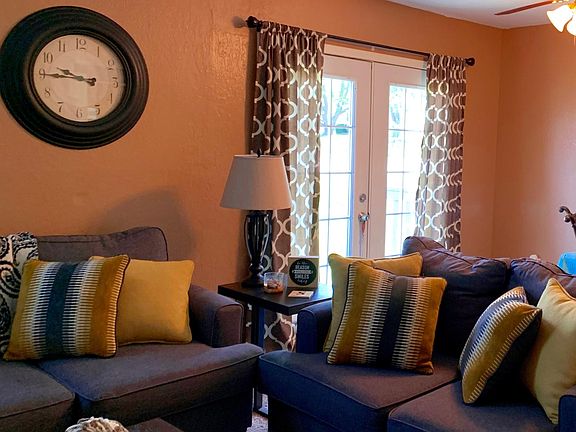 French doors open to private patio.