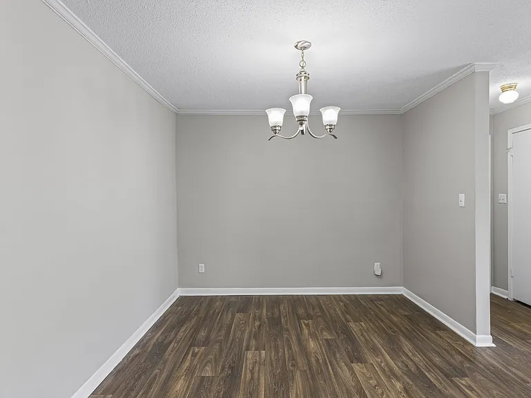 Enjoy stylish living with beautiful wood flooring and elegant chandelier lighting, professionally operated by Highlands Vista Group.