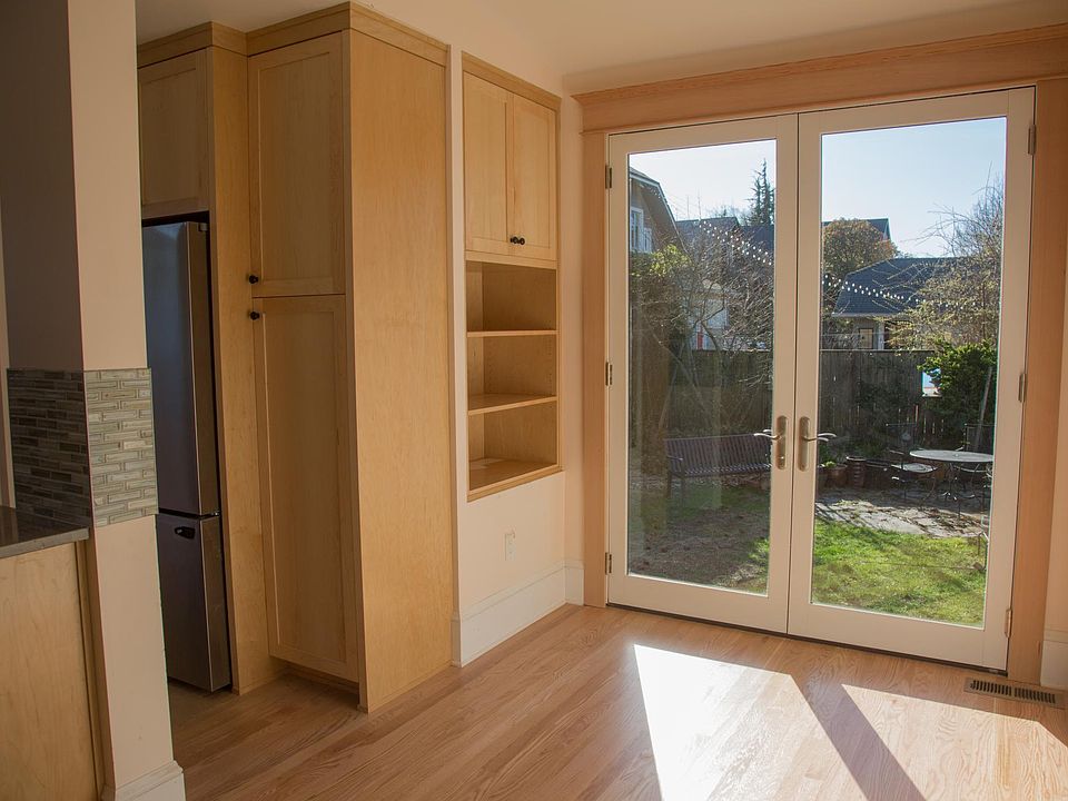 32 x 17 open concept kitchen/dining room with French doors to deck and garden