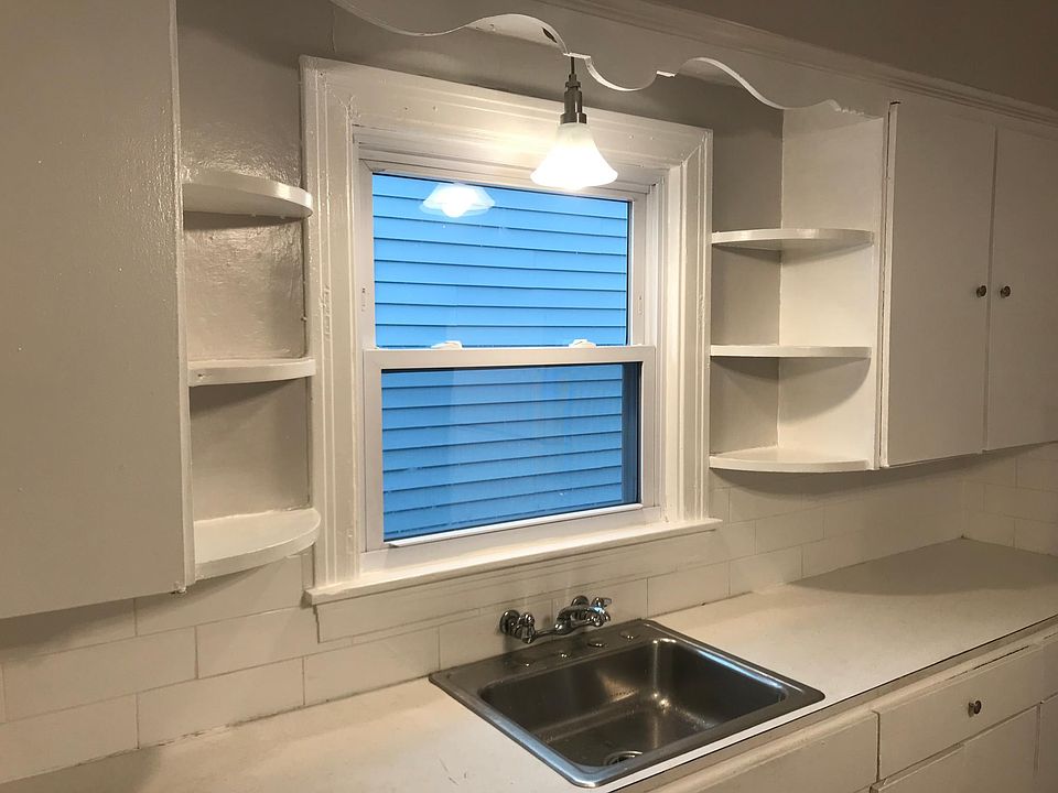 Window and a light above the sink