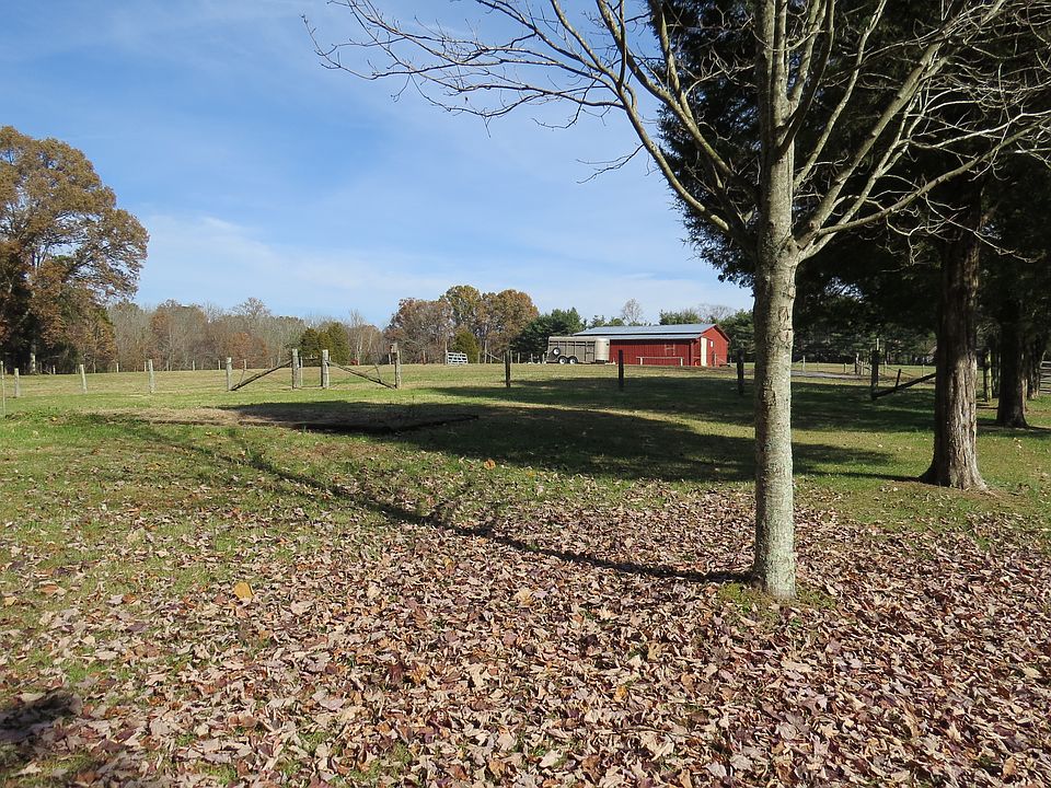 25.74 acres, 2 houses, barn