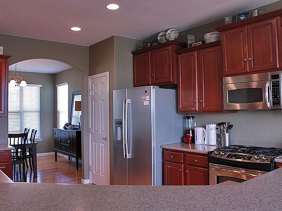 Large kitchen with cherry cabinets and Upgraded Stainless St