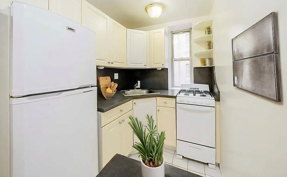2nd image of 144 E 22nd St APT 4F