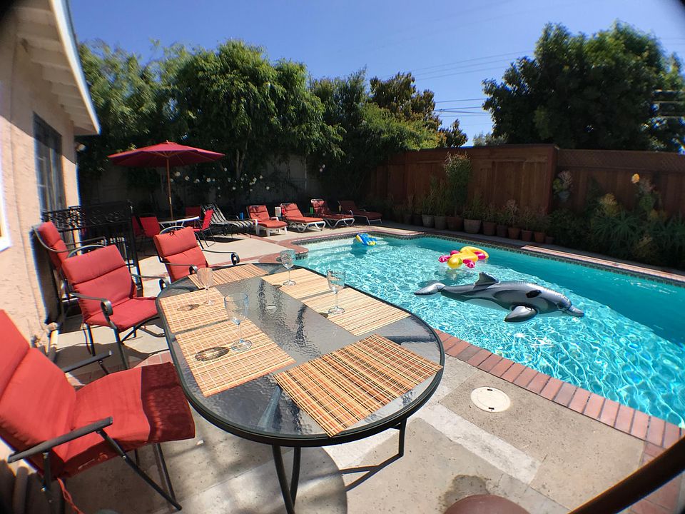 Enjoy sunshine without umbrella, or use umbrella. Best morning sun, coffee poolside.