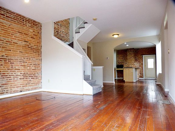 Open 1st Floor w/ Lots of Windows & Exposed Brick!