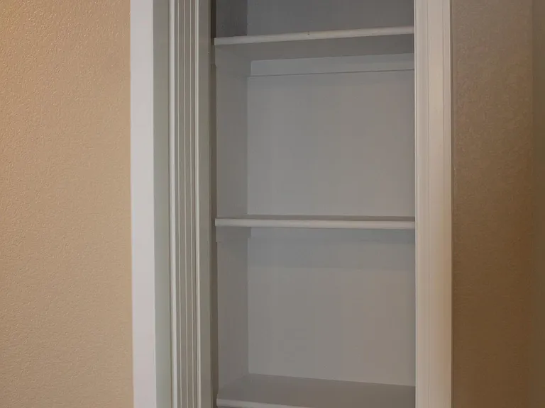 Linen closet upstairs and pantry in kitchen