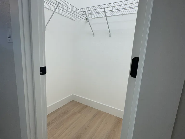 Primary Bedroom Closet (1/2)
