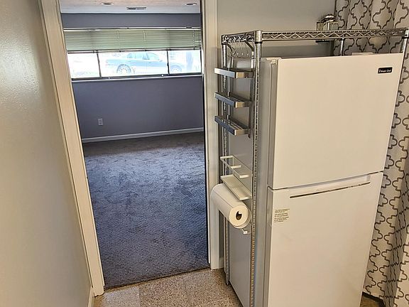 Fridge and entry to living room