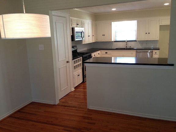 Opens to Dining Room
