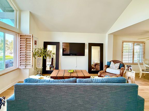 View as you walk up stairs and enter the living room.