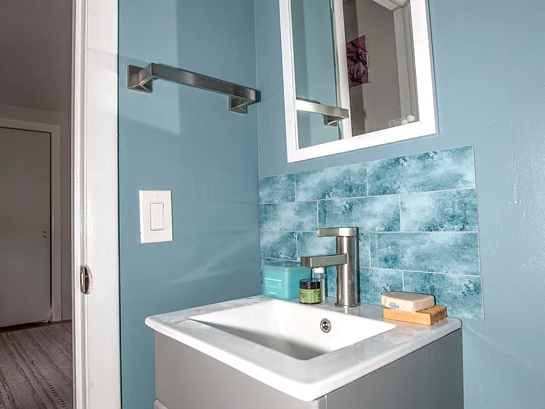 Master BR Bathroom Newly Renovated with new tiles and vanity.