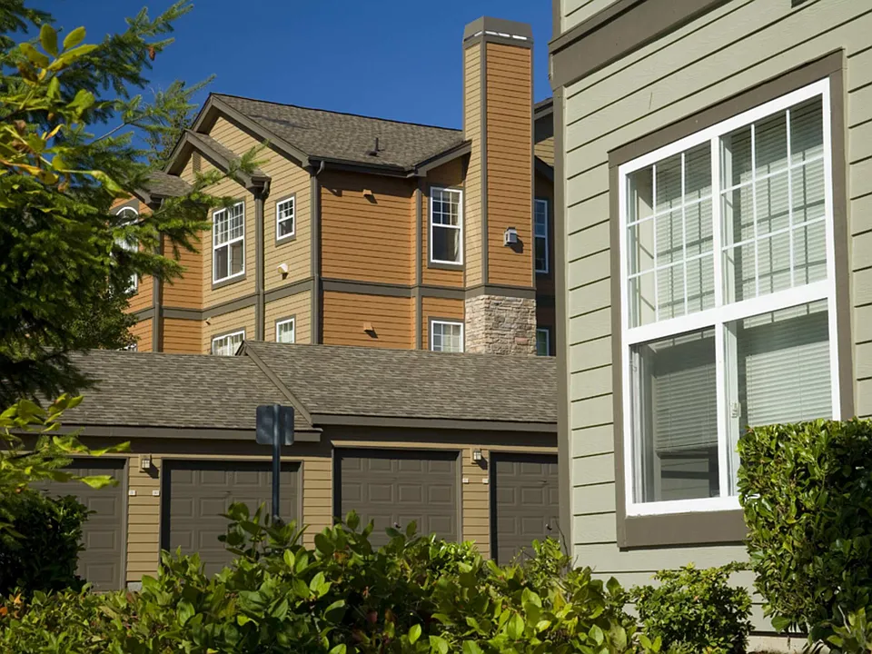 Garages complement the apartment buildings and landscaped grounds at Boulder Creek.