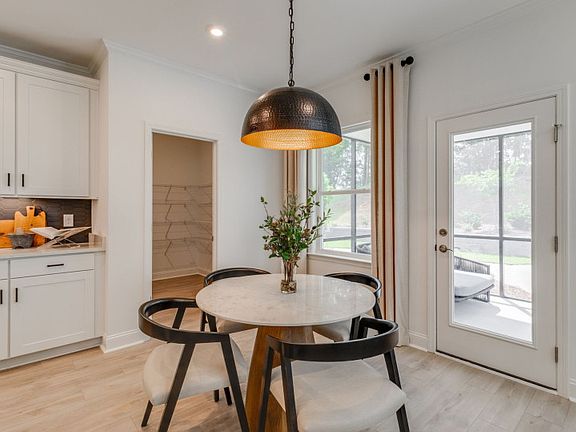 The breakfast cafe leads to the patio for alfresco dining.