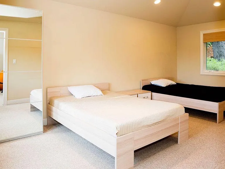 Second bedroom with two full beds