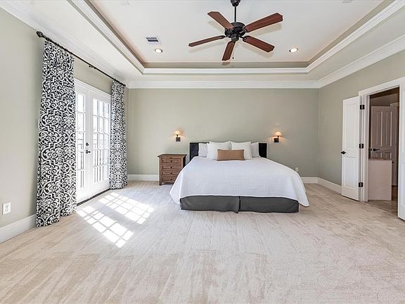 This enormous, yet serene Owner's Suite has the most beautiful lighting and a luxurious en suite bathroom that has all the bells and whistles.