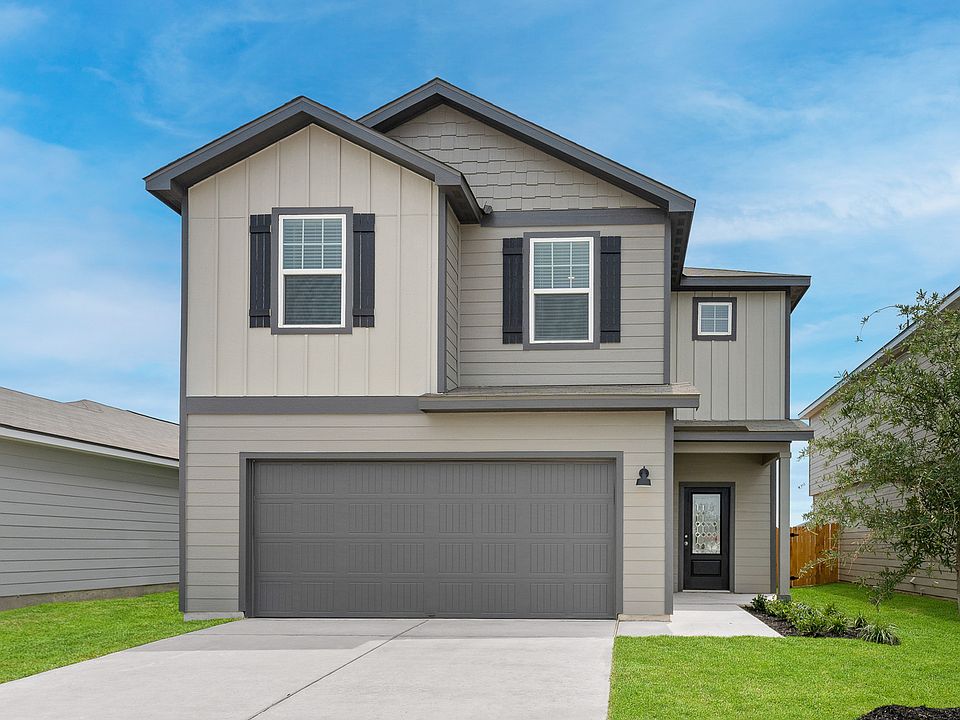 Exterior of the Mesquite plan with professional front yard landscaping.