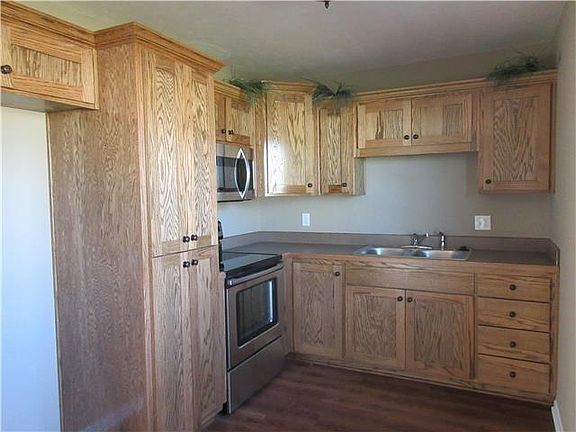 KITCHEN - NEW FLOOR- CABINETS - COUNTER TOP - APPLIANCES - NEW PAINT