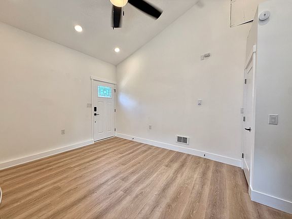 Rear entrance w/private fenced backyard space