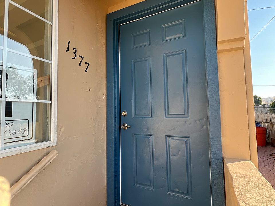 FRESH PAINTED BUILDING AND ENTRANCE