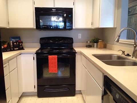 Open kitchen overlooks the living room