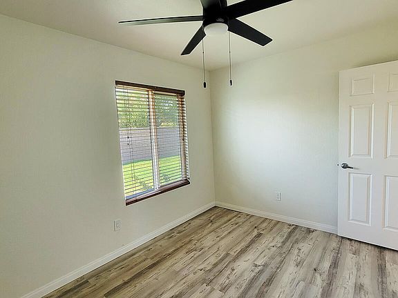Bedrooms feature brand new pergp floors and modern ceiling fans as well as the whole property is freshly painted