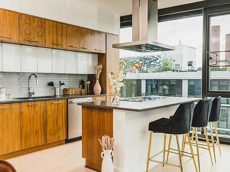 Chef's-style kitchens with island, hood range, and double-ovens