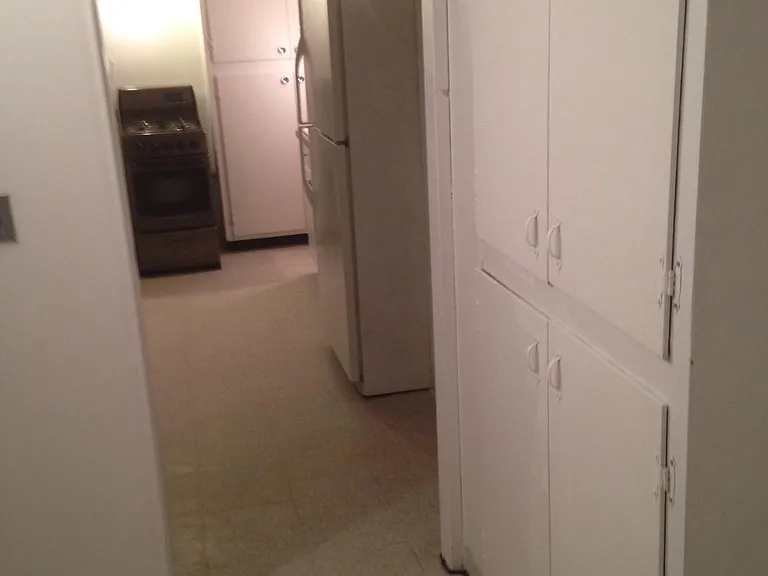 inside bonus room looking out to kitchen