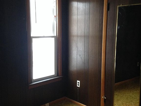 master bedroom with carpeted closet