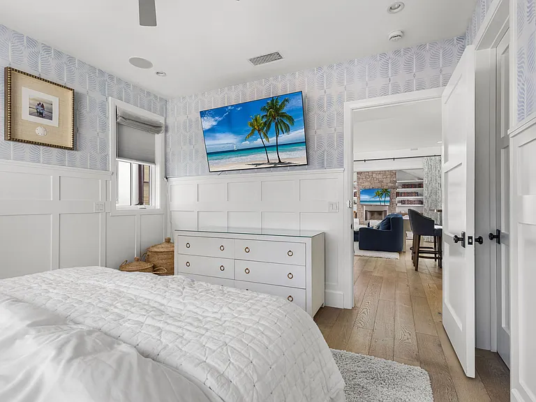 Primary bedroom with TV