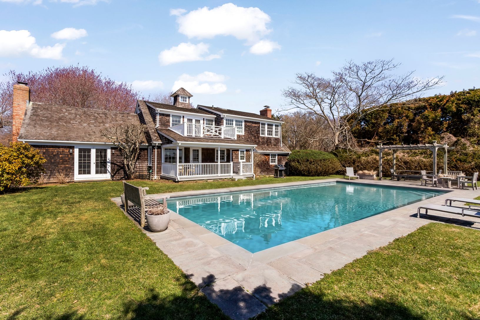  Large Heated Gunite Pool with Bluestone Patio, Pergola, Covered Porch and Second Story Deck