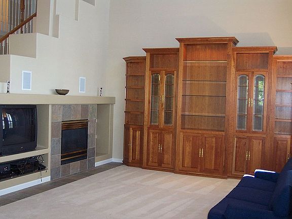Living room w/ custom cabinet