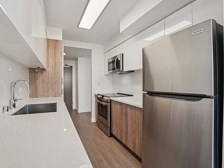 Renovated kitchen with stainless steel appliances