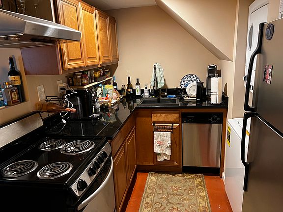 Electric kitchen with dishwasher, W/D, and microwave