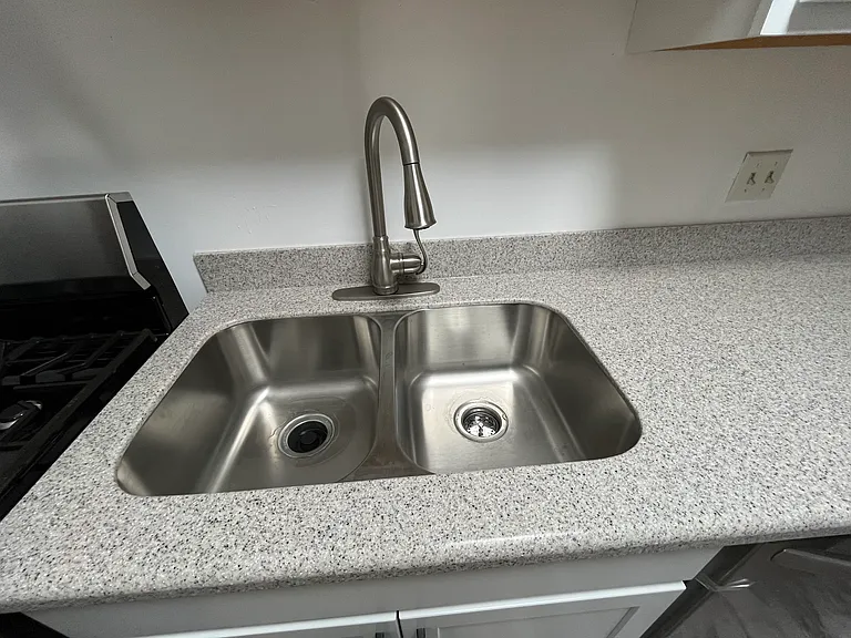 Brand new kitchen sink and faucet