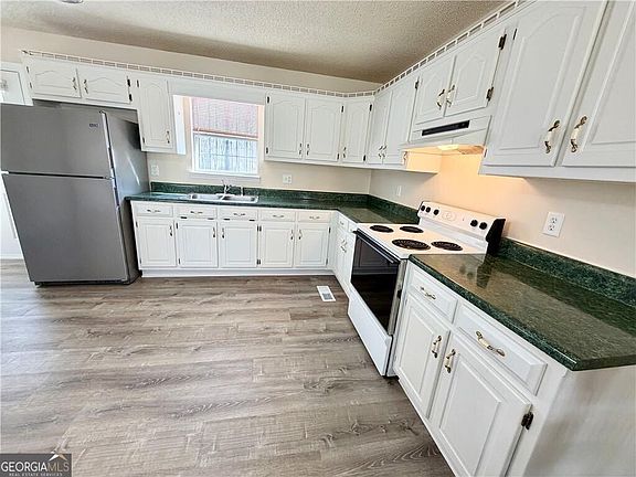 5th image of 633 Cash Rd NE