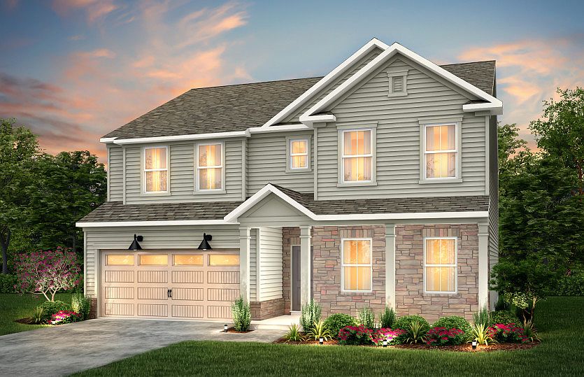 Mitchell Exterior LC2P features siding, stone, covered front siting porch and 2 car garage