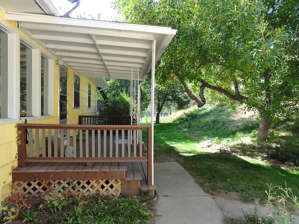 Fenced backyard with hillside (more privacy).