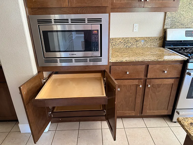 Kitchen equipped with pull out drawers for easy access