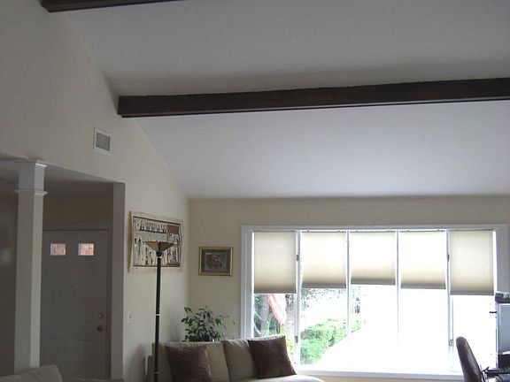 Greatroom with cathedral beamed ceiling