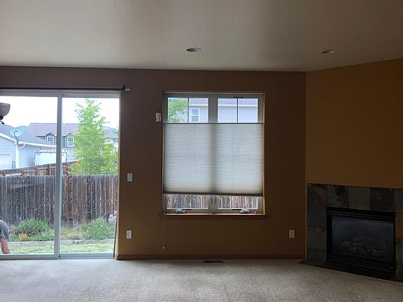 Living room-working gas fireplace-bay window.